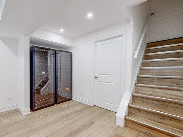 Warm-colored laminate flooring in a basement