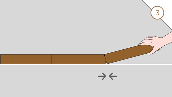 Lay the flooring one by one using one hand.