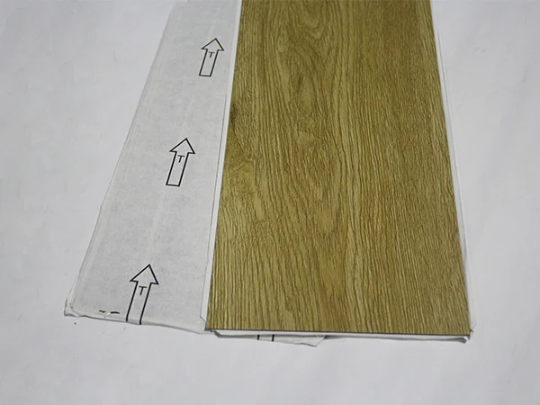 Front and back sides of LVT self-adhesive flooring