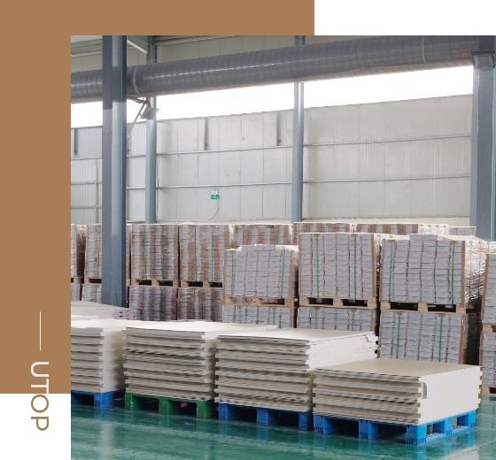 The well packed SPC floor planks are placed on the warehouse.