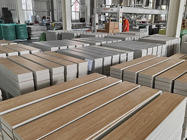 SPC flooring orders ready for dispatch in the workshop.