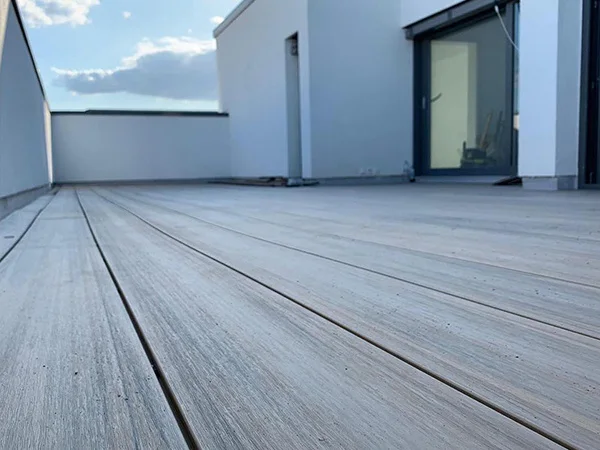 Uniform-sized WPC flooring for balcony installation