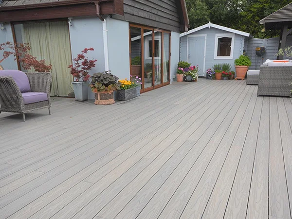 WPC Flooring for gardens with potted plants & fresh flowers